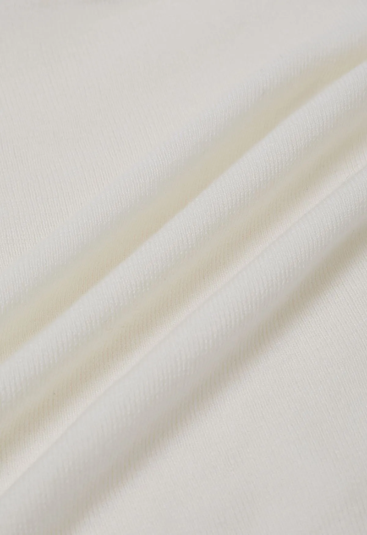 Haut en tricot à manches longues et à col croisé doux en blanc