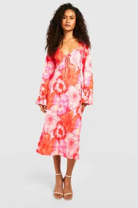 Robe fleurie à découpes
